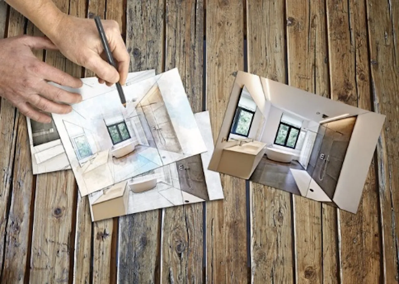 Sascha Stivic - macht Badezimmer-Skizzen mit der Hand auf Papier